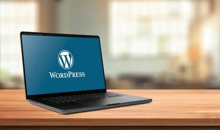 Ordinateur portable de bureau affichant le logo WordPress à l'écran, illustrant la décision de créer un site sur wordpress pour une activité professionnelle.